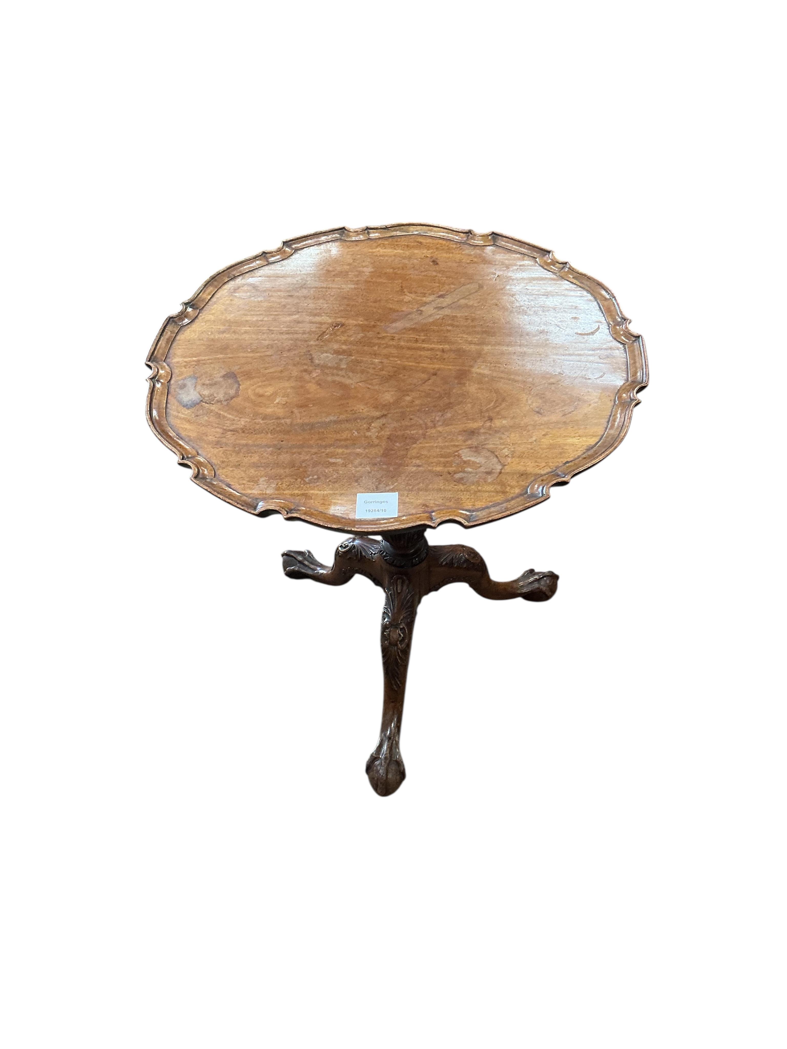 A small George III style circular tilt top mahogany tripod wine table, diameter 54cm, height 59cm